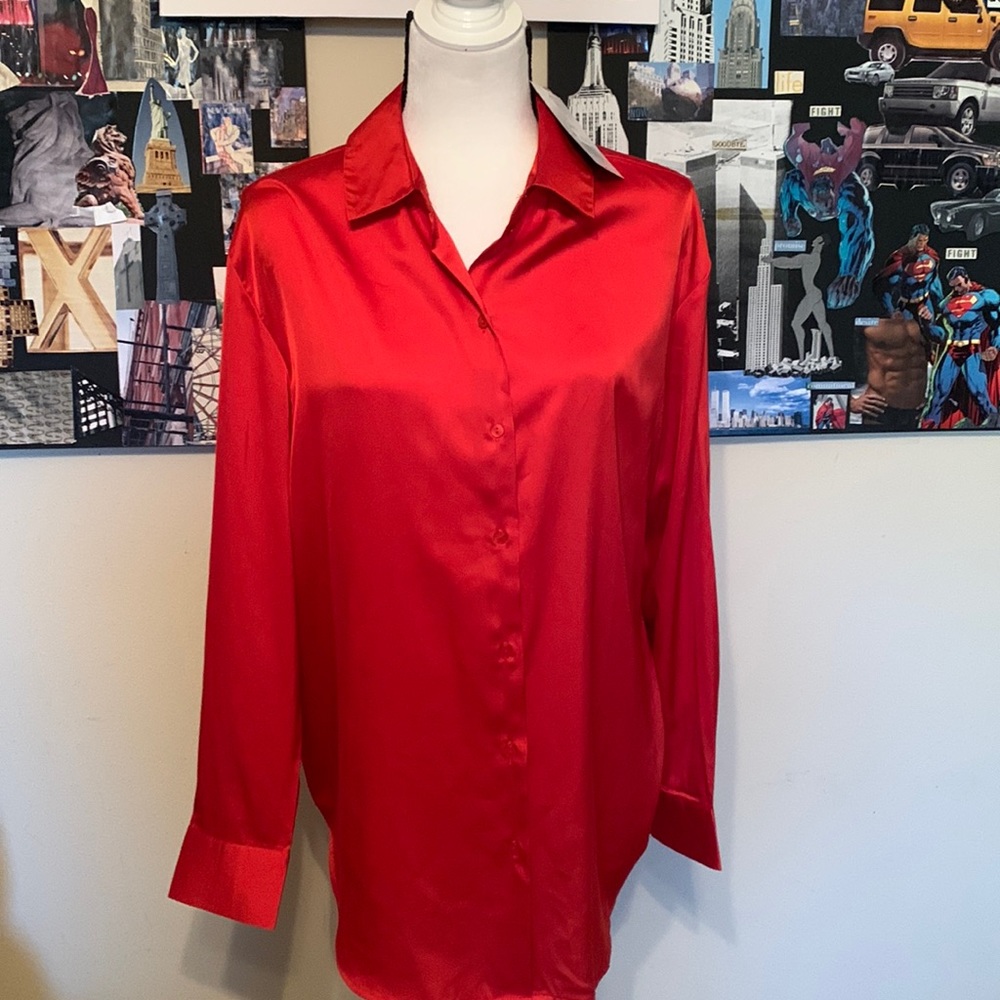 Red polyester button up shirt by the limited. Size L